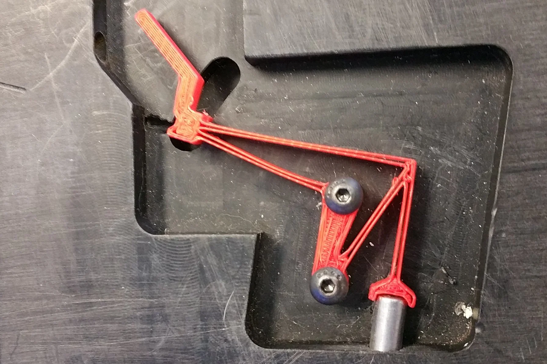 Joint-less Latch This single-part mechanism eliminated assembly and contamination from lubrication.