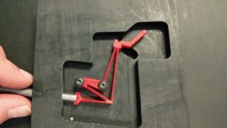 Our client need to replace an assembly of metal arms and pins that would get sticky and gum up.
