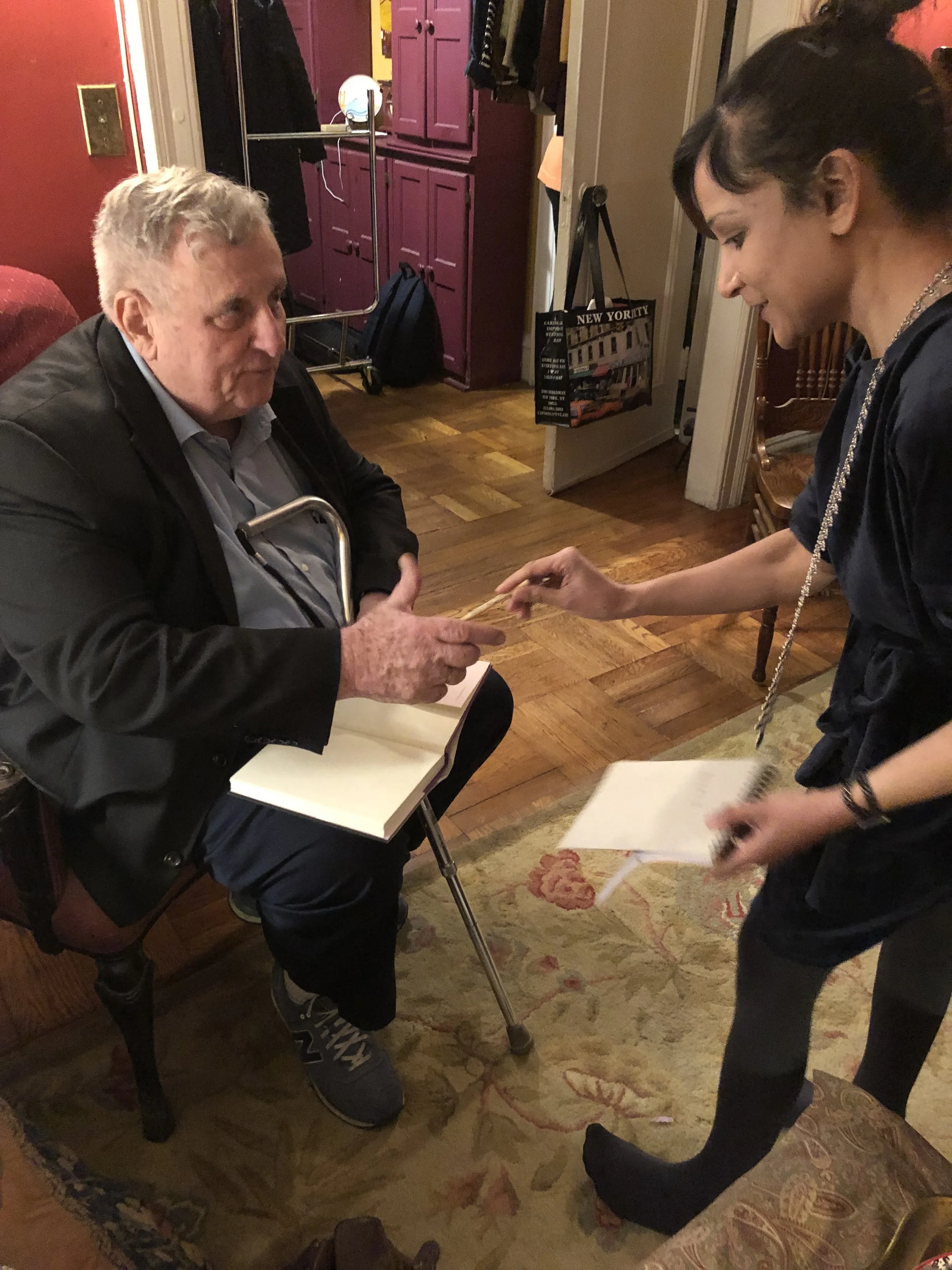 The late Edmund White signs a copy of THE UNPUNISHED VICE