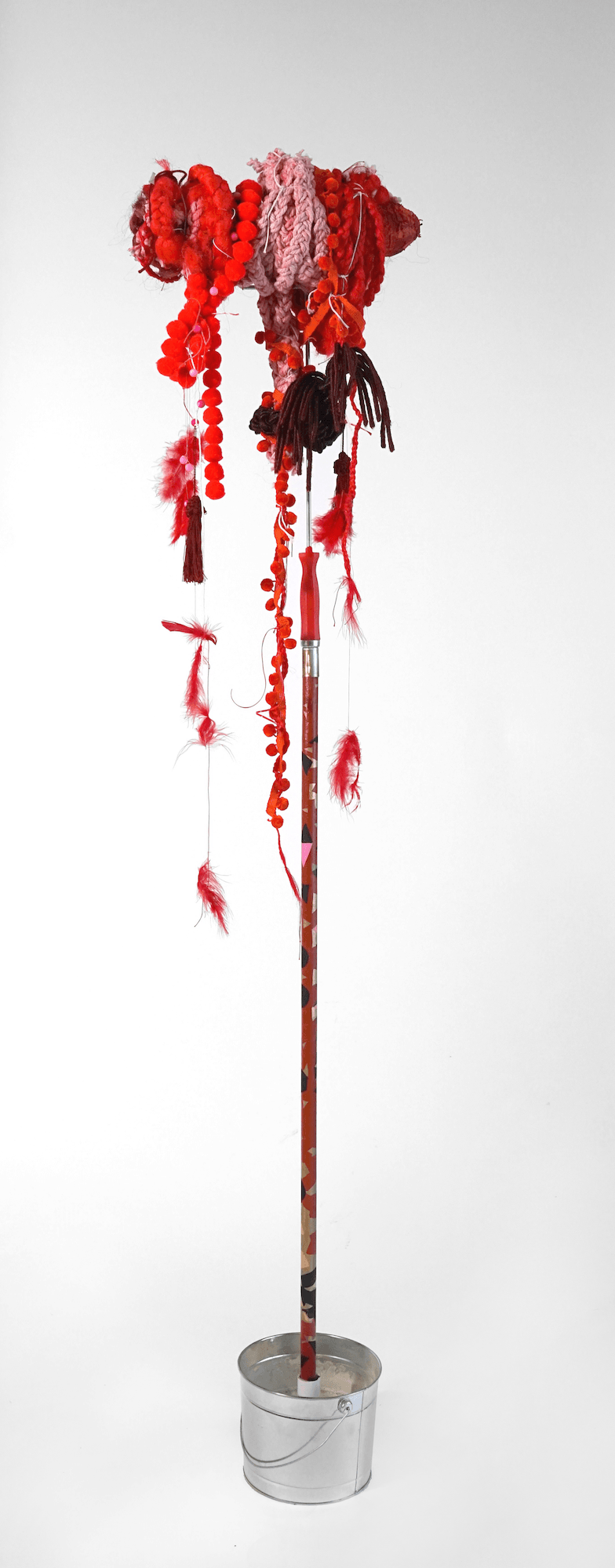  "Mop 3”, from the Series Whips, Whims and Wigs, 2019, Transformed mop head into a hairdo on &nbsp; decorated stick, various materials 