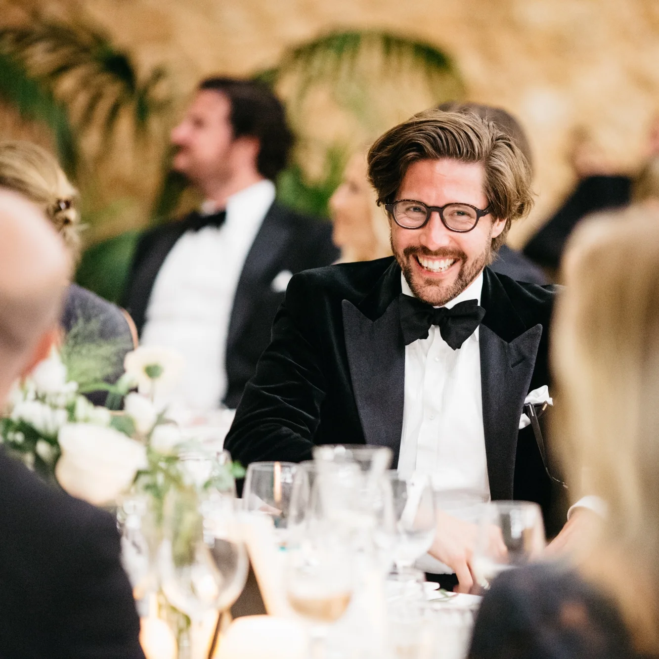 Götrich co-owner Simon Berg in a black velvet dinner jacket with peak lapels and grosgrain facings.