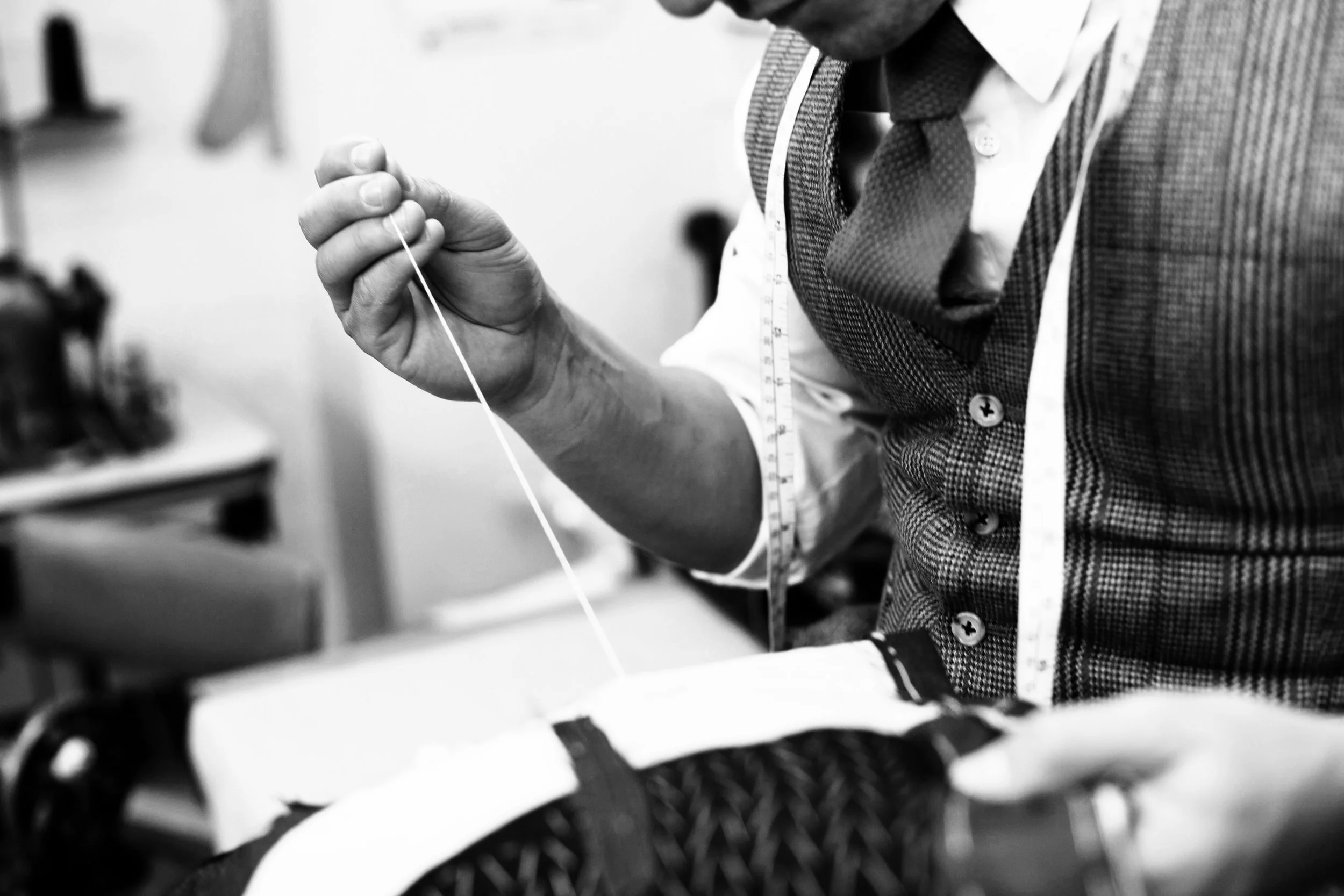 Close attention to detail and many hours of work go into each bespoke suit.