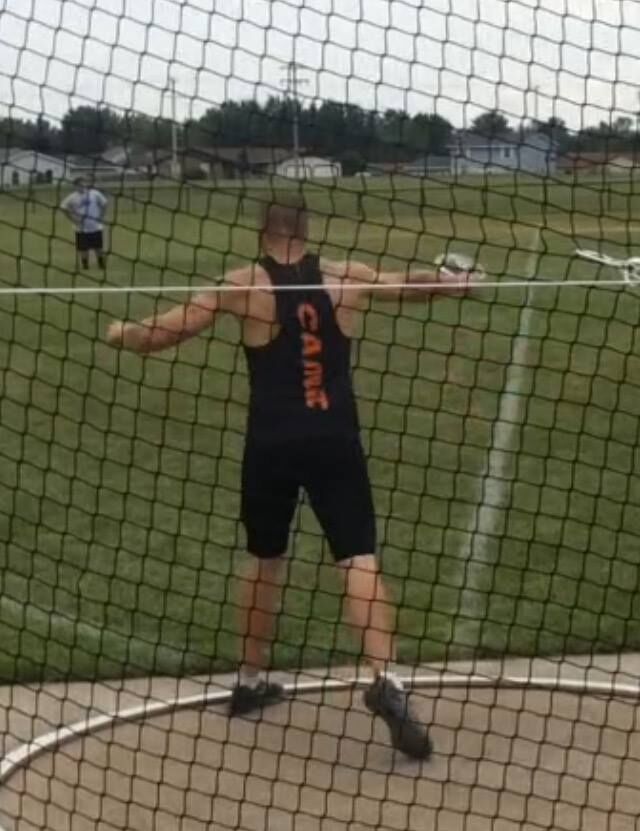 Justin setting the discus US record at the Meijer State Games of Michigan 2017. Courtesy of Justin Caine.