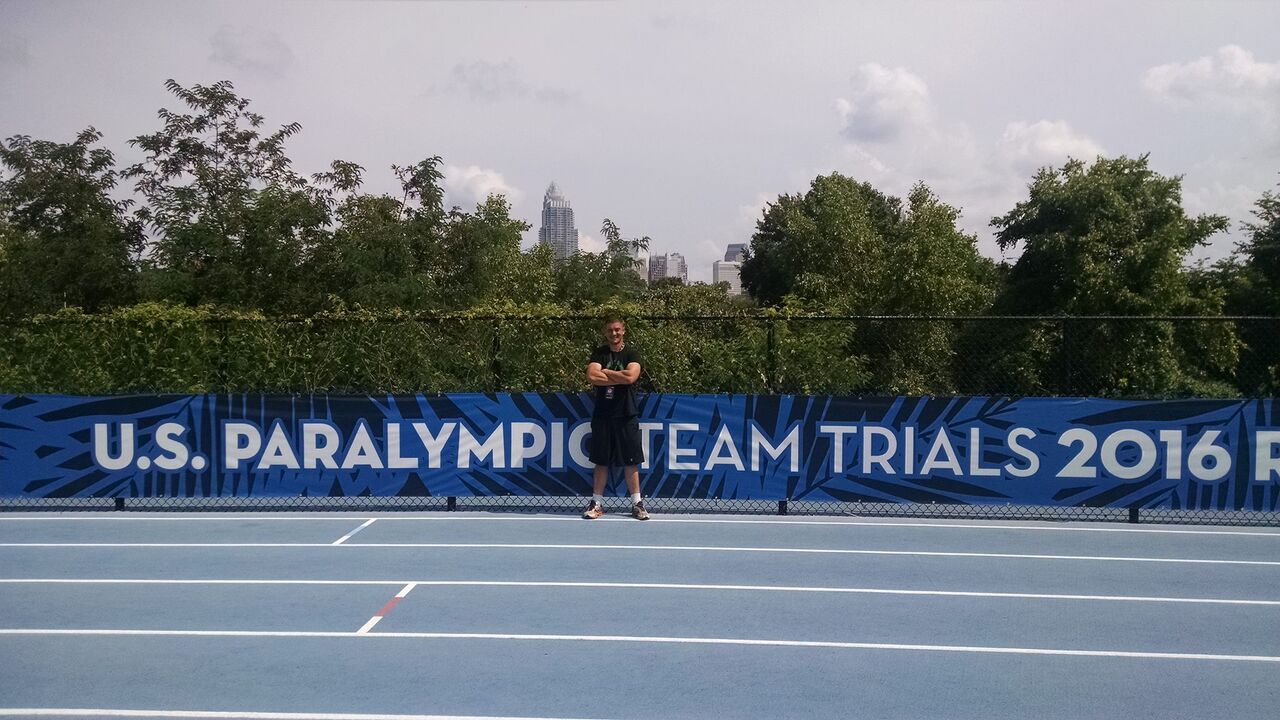 Justin stands for a picture at the U.S. Paralympic Team Trials in 2016 in Charlotte, North Carolina. Courtesy of Justin Caine.