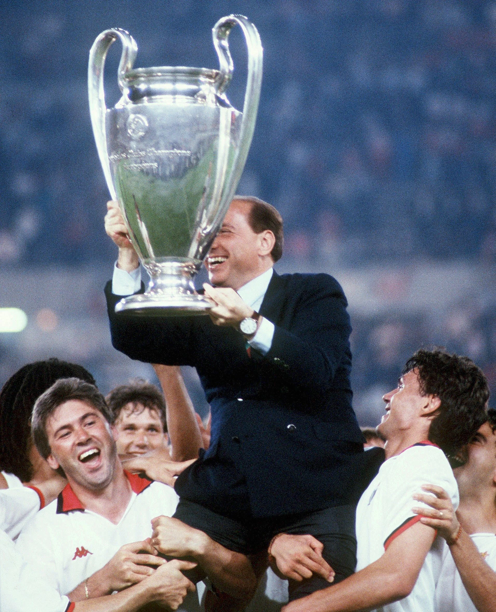 Silvio Berlusconi, former Italian Prime Minister and owner of AC Milan from 1986-2017, celebrates the team's 1994 win in the Europa League. Photo by Bongarts/Getty Images