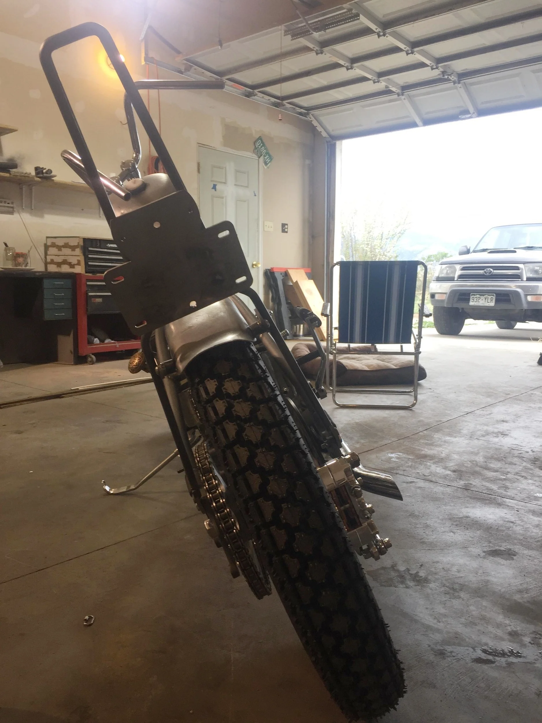 Prism supply tail light and license plate bracket