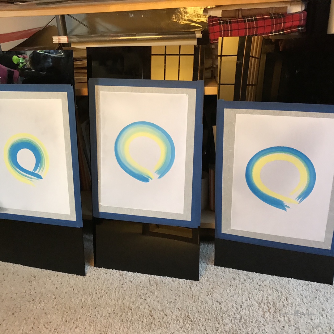 Drying art on plexiglass mounting boards