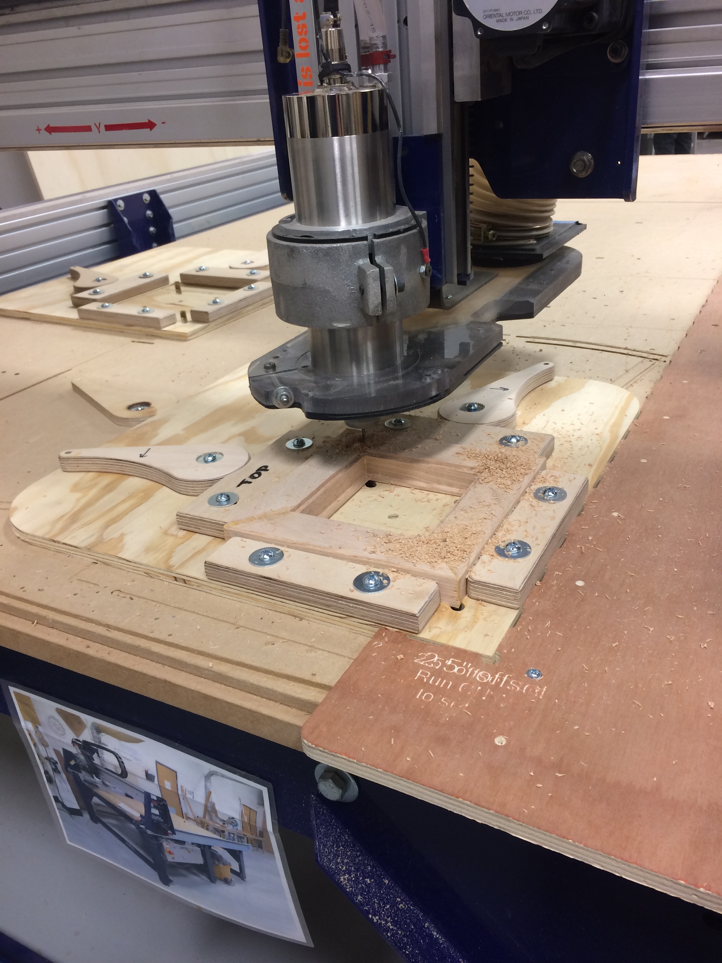 Copy of ShopBot CNC router cutting bowtie holes in the back