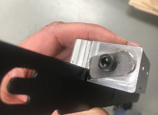 Deburring tool (clamped blade from a utility knife