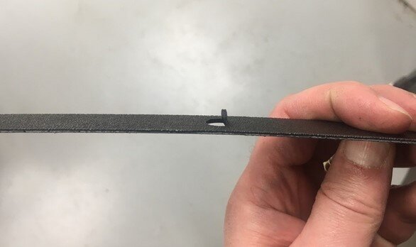 The center tab once it has been heat bent out.