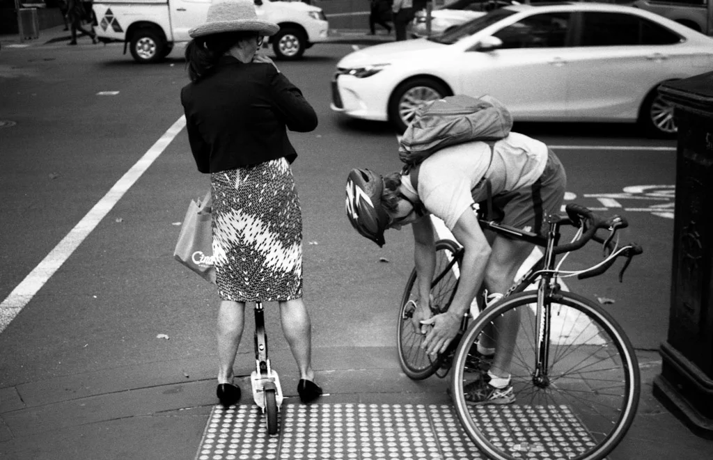 Stephen Bowater - Man bike, woman scooter
