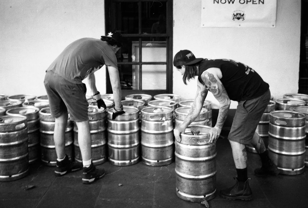 Stephen Bowater - Men and beer kegs