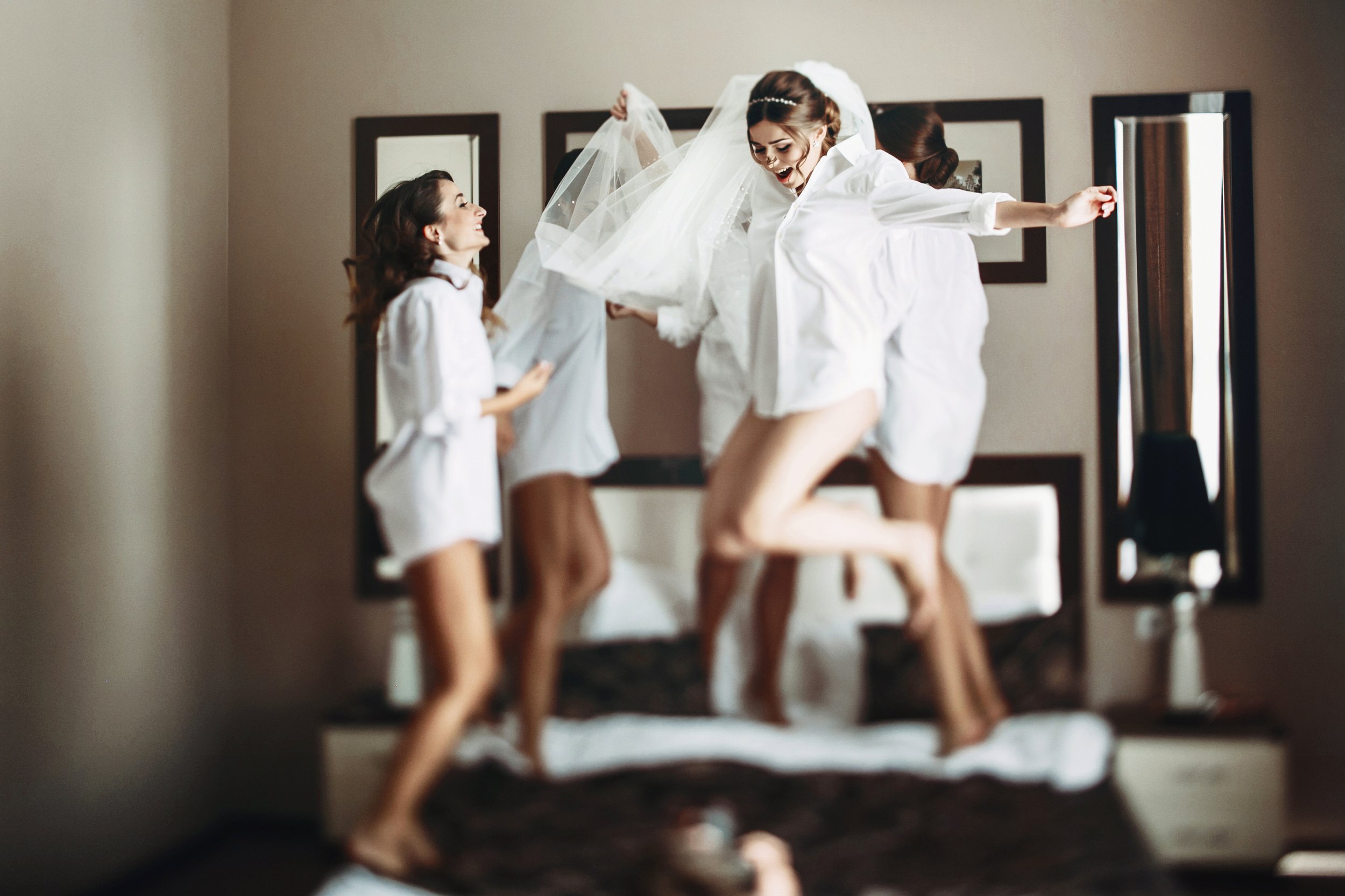 Bridal Prep - Jumping on bed.jpg