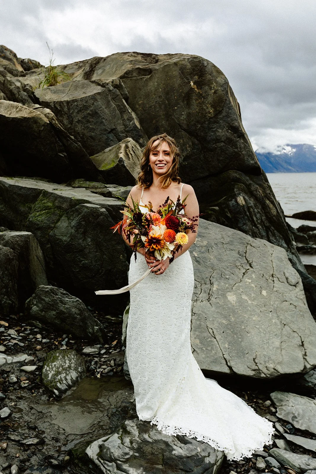 Bride and fall bouquet for Alaskan wedding