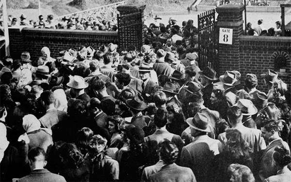 “Students crowd into the stadium to cheer UC to victory” (UC Libraries)