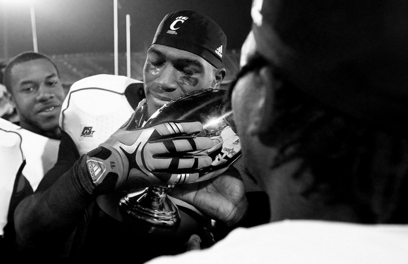  Solomon Tentman holds the Big East Championship trophy following UC’s 2012 win over UConn. ( Jared Wickerham ) 