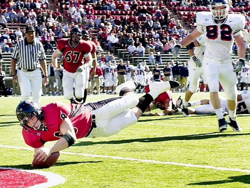 Gino Guidugli gets six against UConn in 2001. (Jeff Swinger)