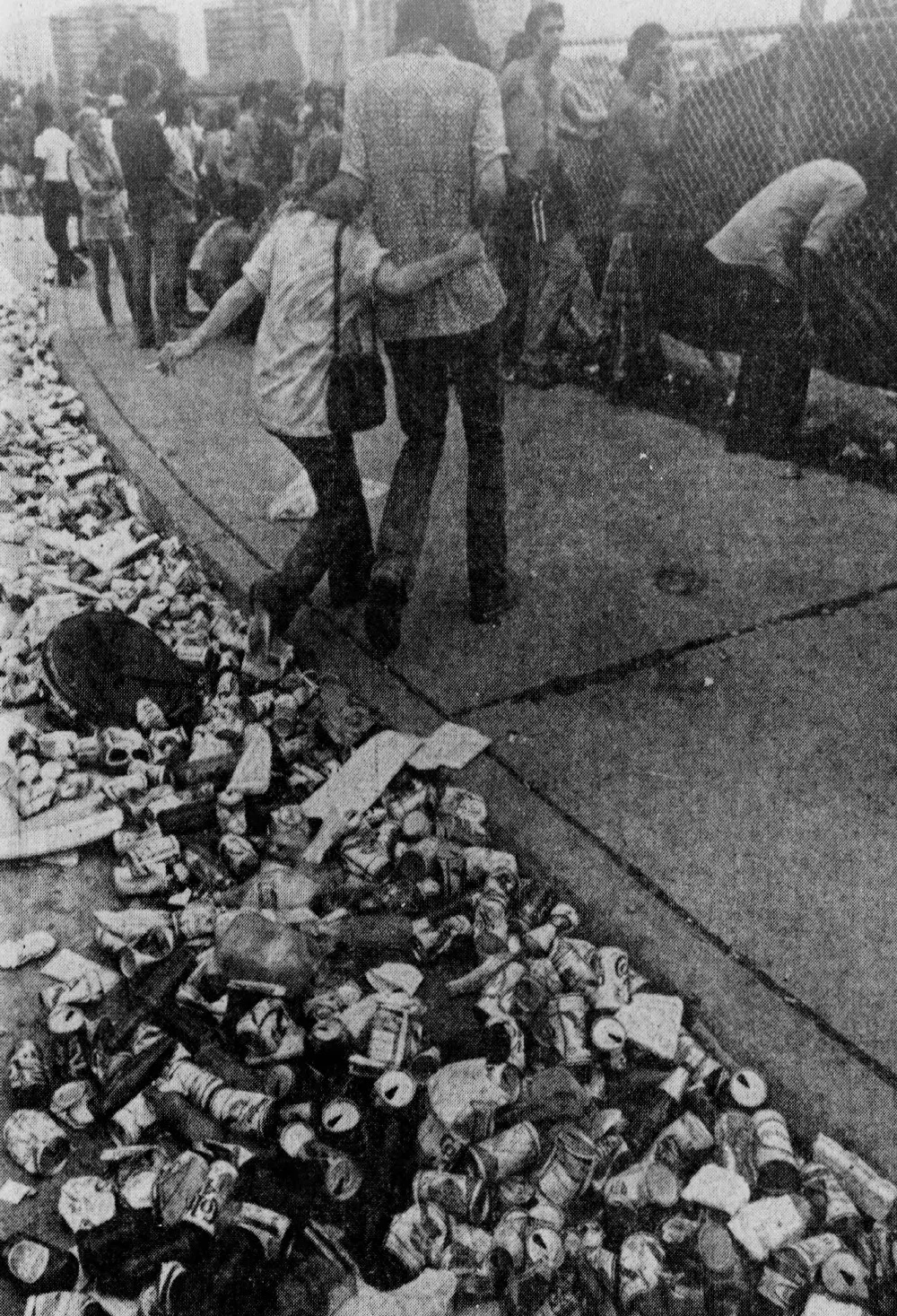 Beer cans and garbage line the festival grounds