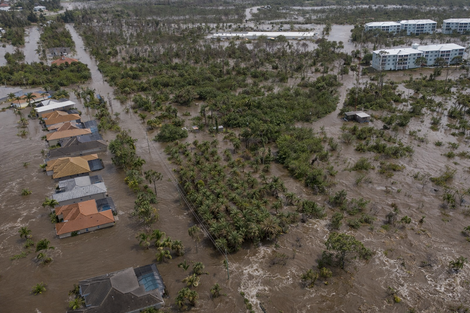 Flooded community after heavy rainfall.png