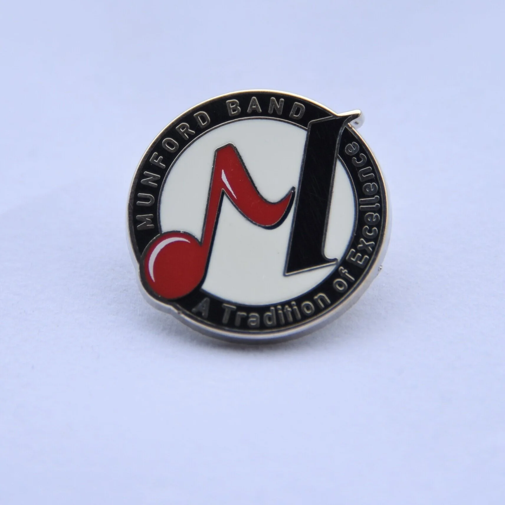 "A Tradition of Excellence" Pin