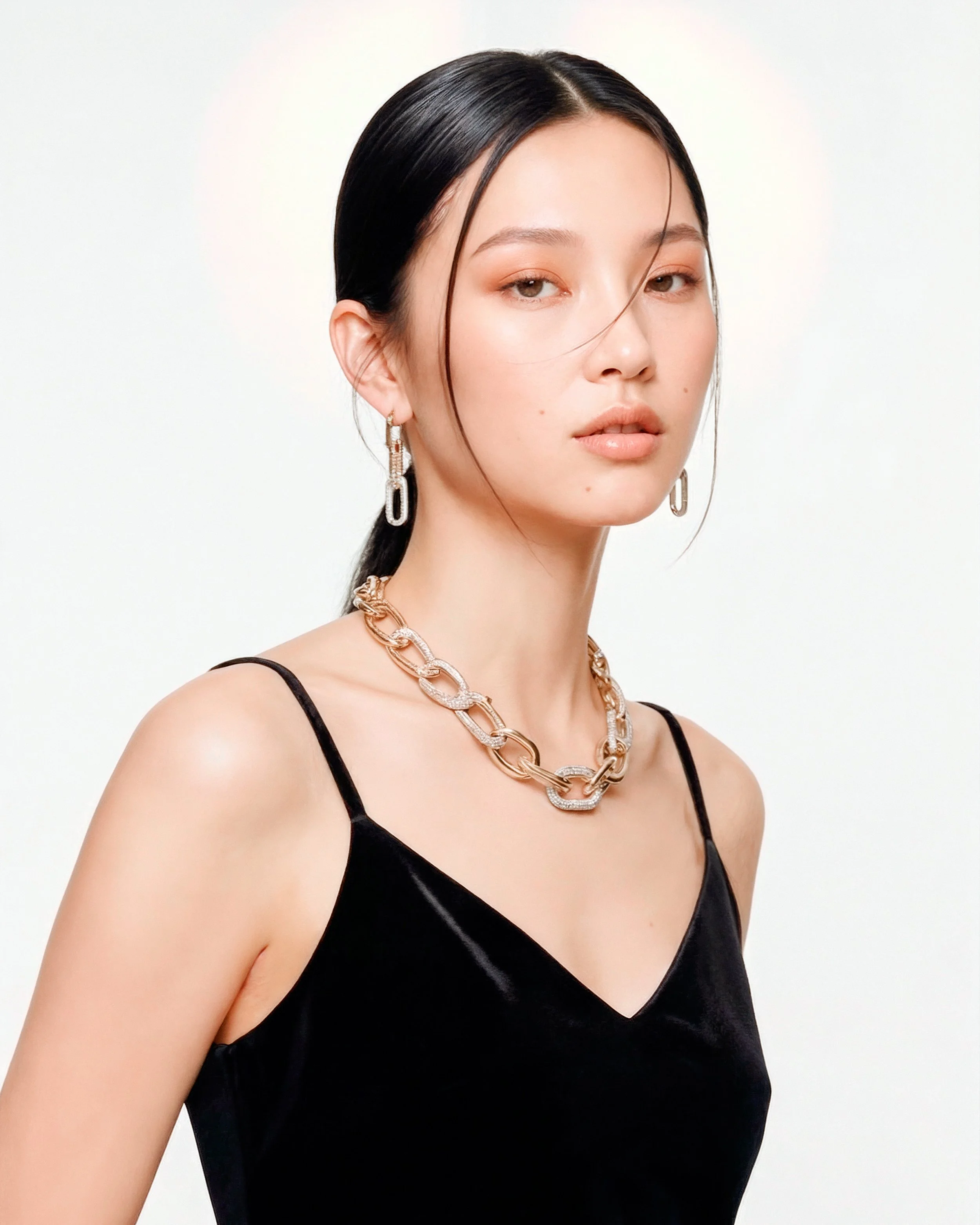 Asian Model with luxury gold chain necklace