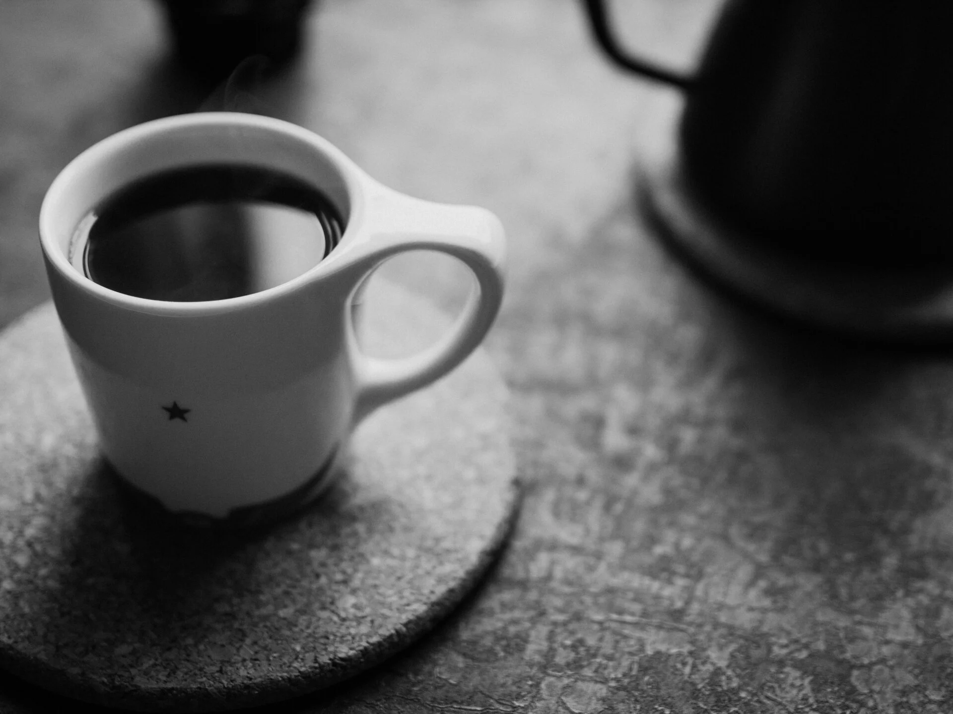 A cup of coffee sitting on a table