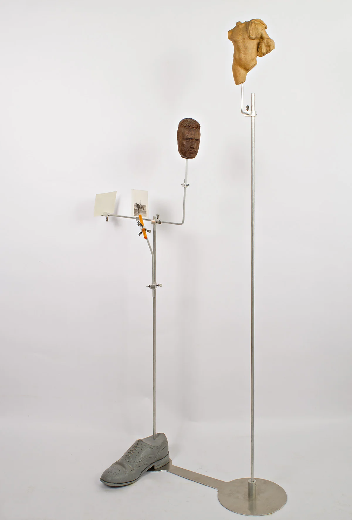 Work from A Broken Index, 2017. Aluminum, acrylic, cast urethane, walnut, pine and vintage photograph. 50" x 36" x 12"