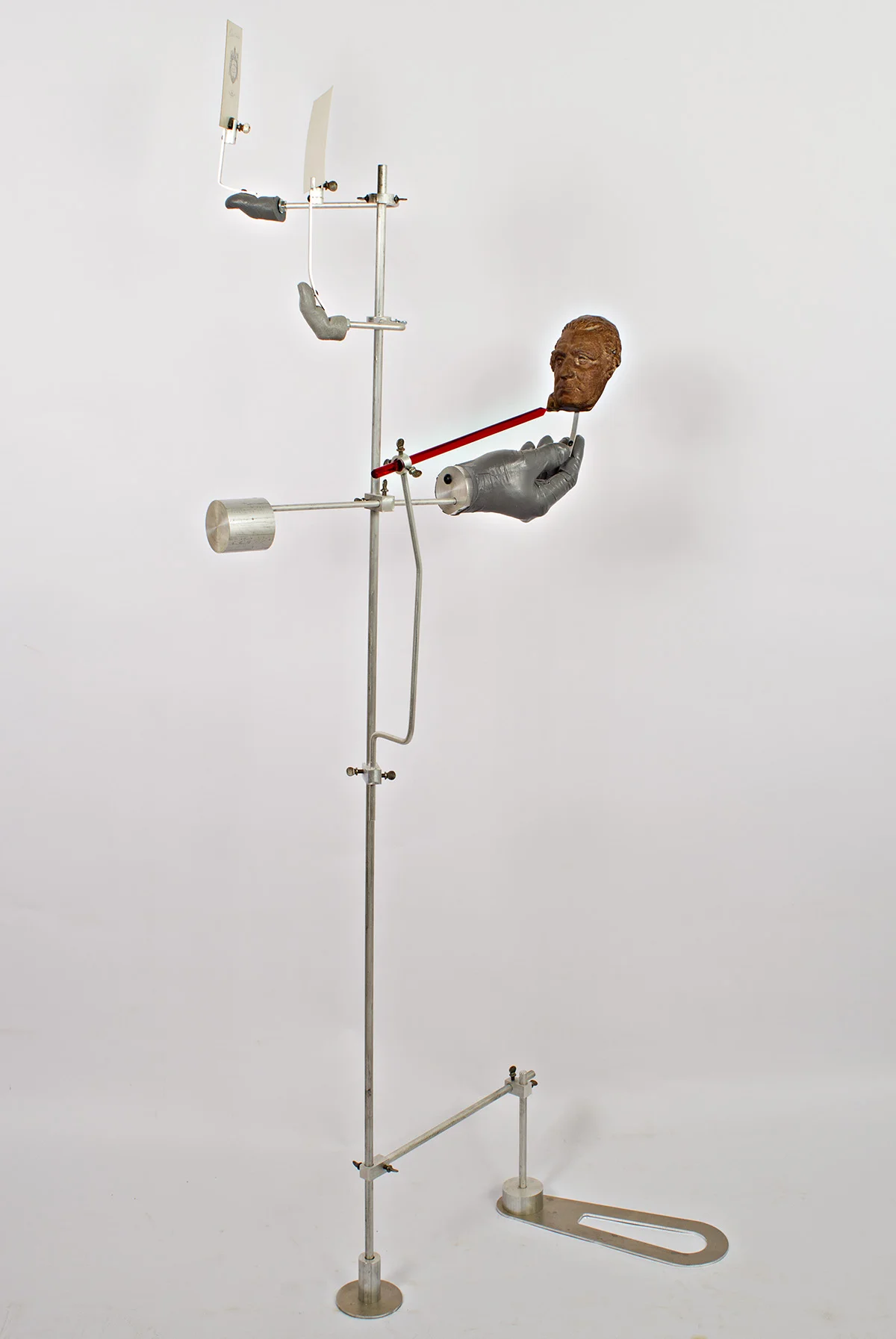 Work from A Broken Index, 2017. Aluminum, acrylic, cast urethane, walnut and vintage photographs. 48" x 20" x 12"