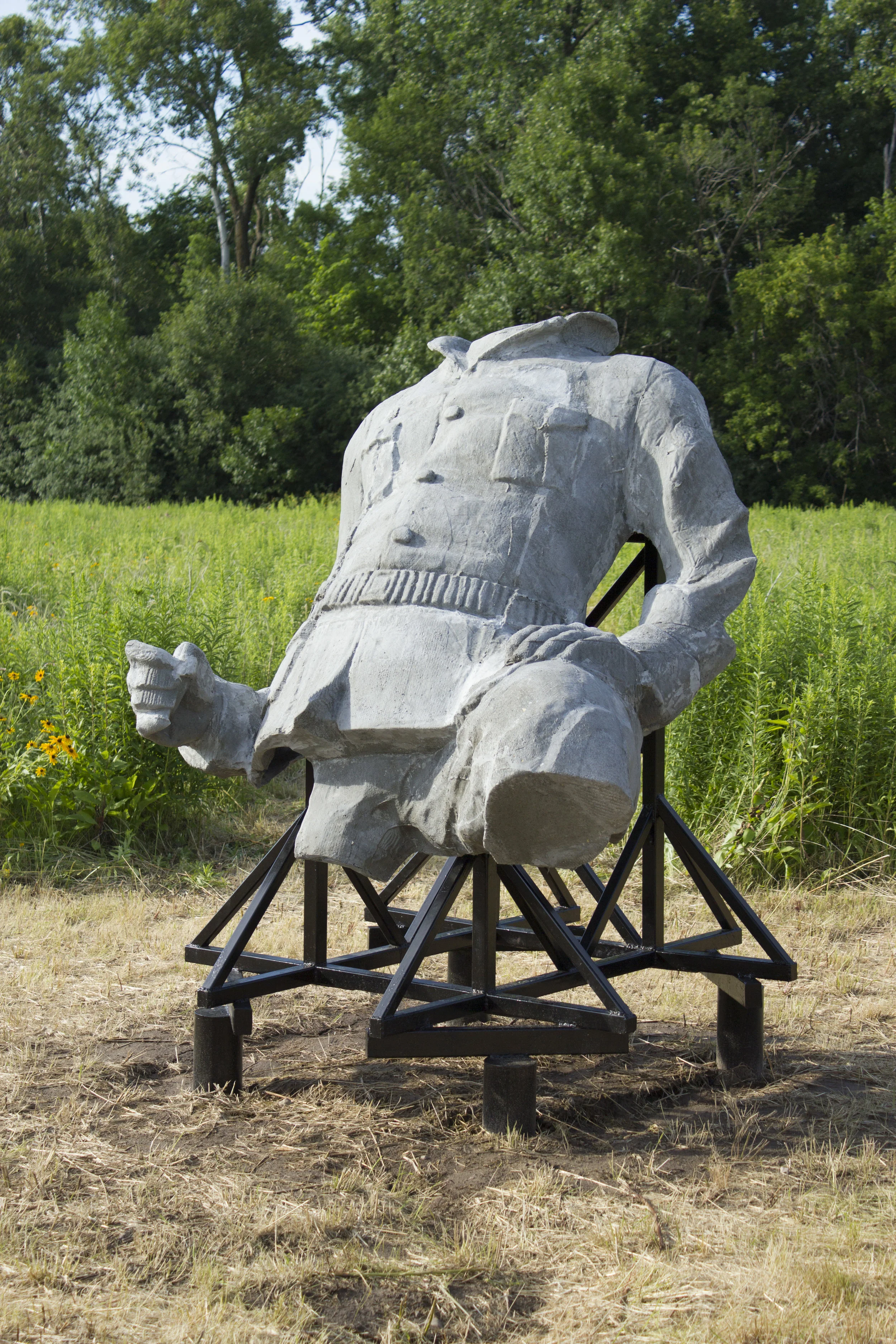 View of torso. 7’ 10” x 6’ x 5’.