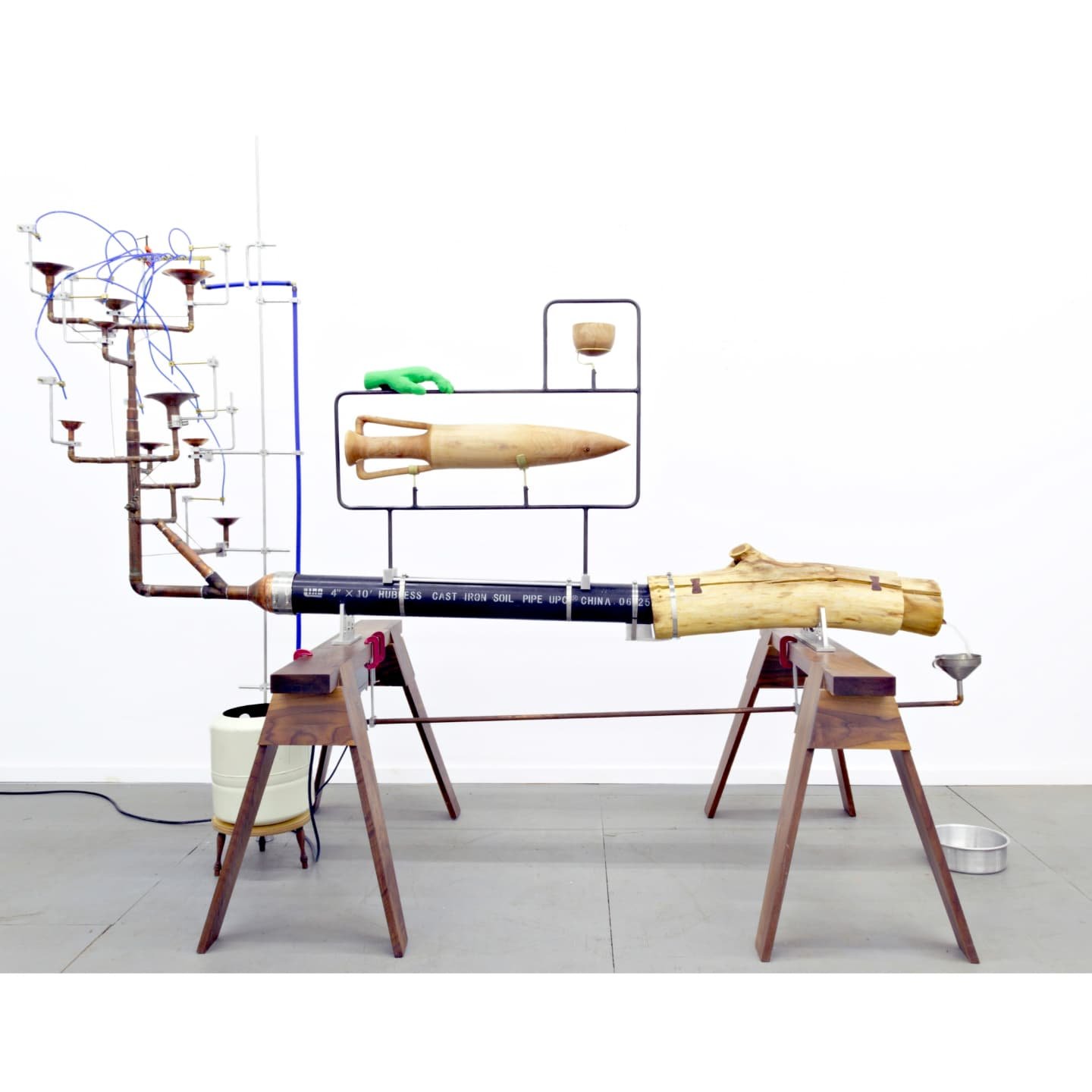 Provisional System IV (A Very Human Impulse), 2024

84&rdquo; x 103&rdquo; x 42&rdquo;

Walnut, birch, basswood, honey locust, plywood, aluminum, copper, brass, steel, cast iron drainpipe, expansion cell tank, funnel, Chroma-Key paint, C-clamps, grap