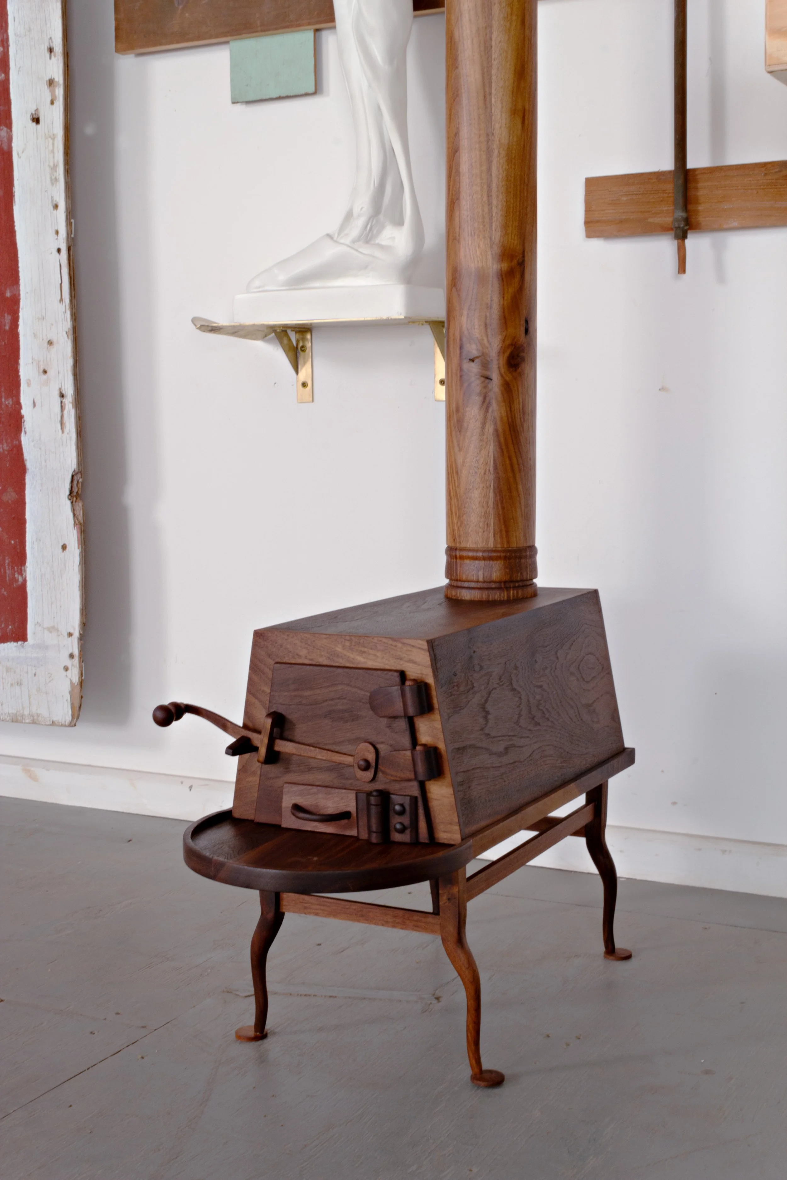   Essays for an Architectural Love Letter (After Christopher Alexander),      2012-2026.  Detail of walnut Shaker stove.  