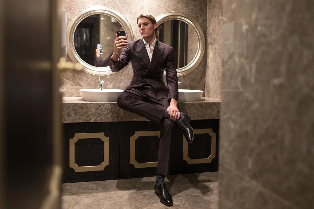 Jack wears suit and shoes by Gieves & Hawkes and Richard James shirt