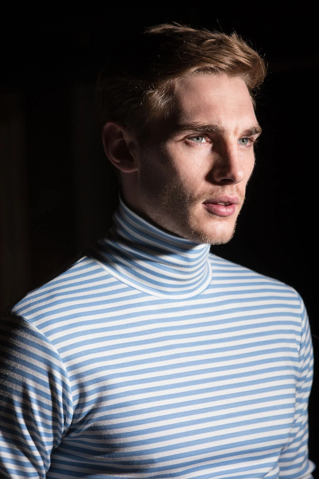 Tommy wears Daniel w Fletcher polo neck with Basic Rights trousers