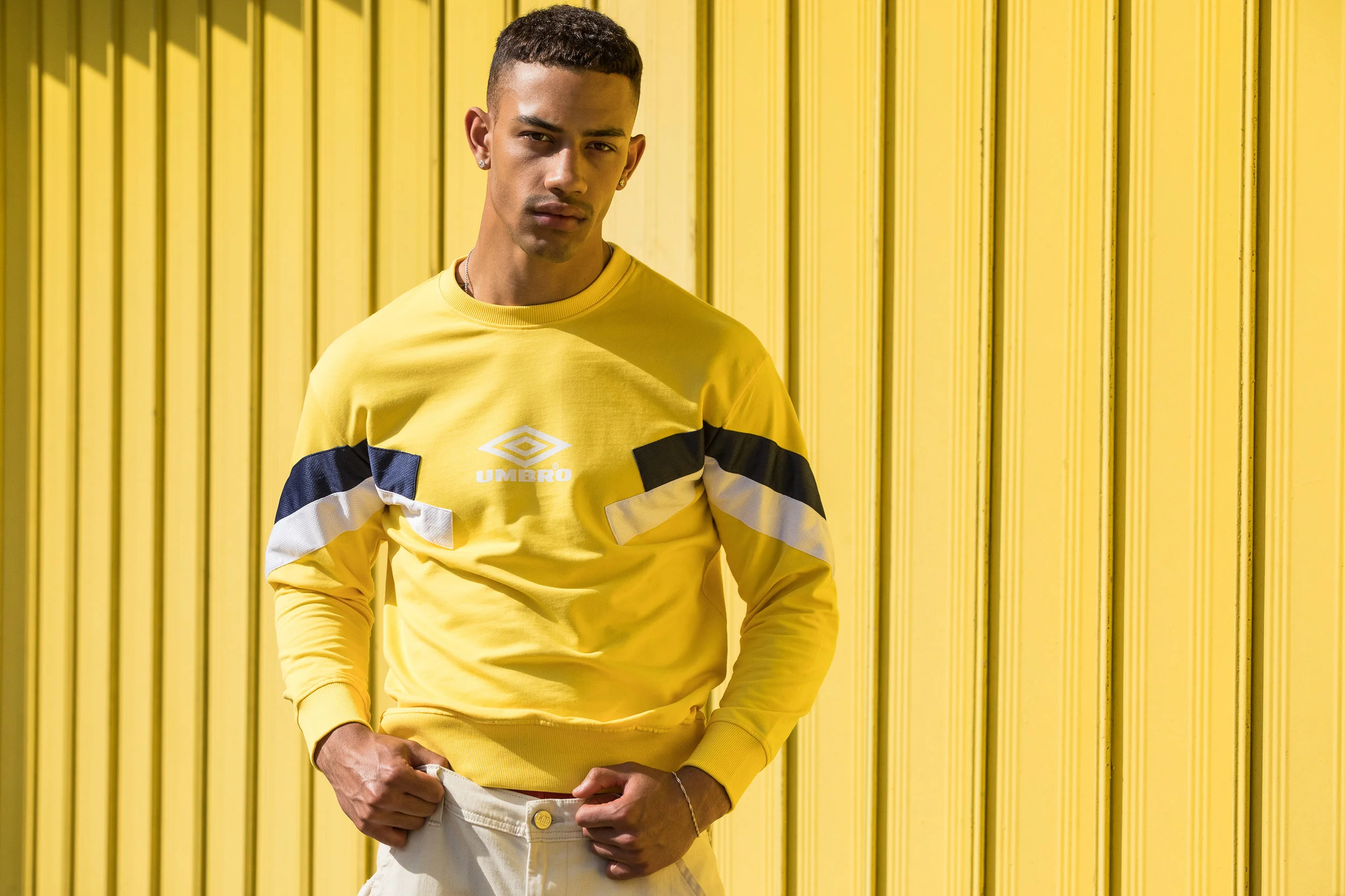 Ben wears Umbro sweater with Scotch & Soda chinos