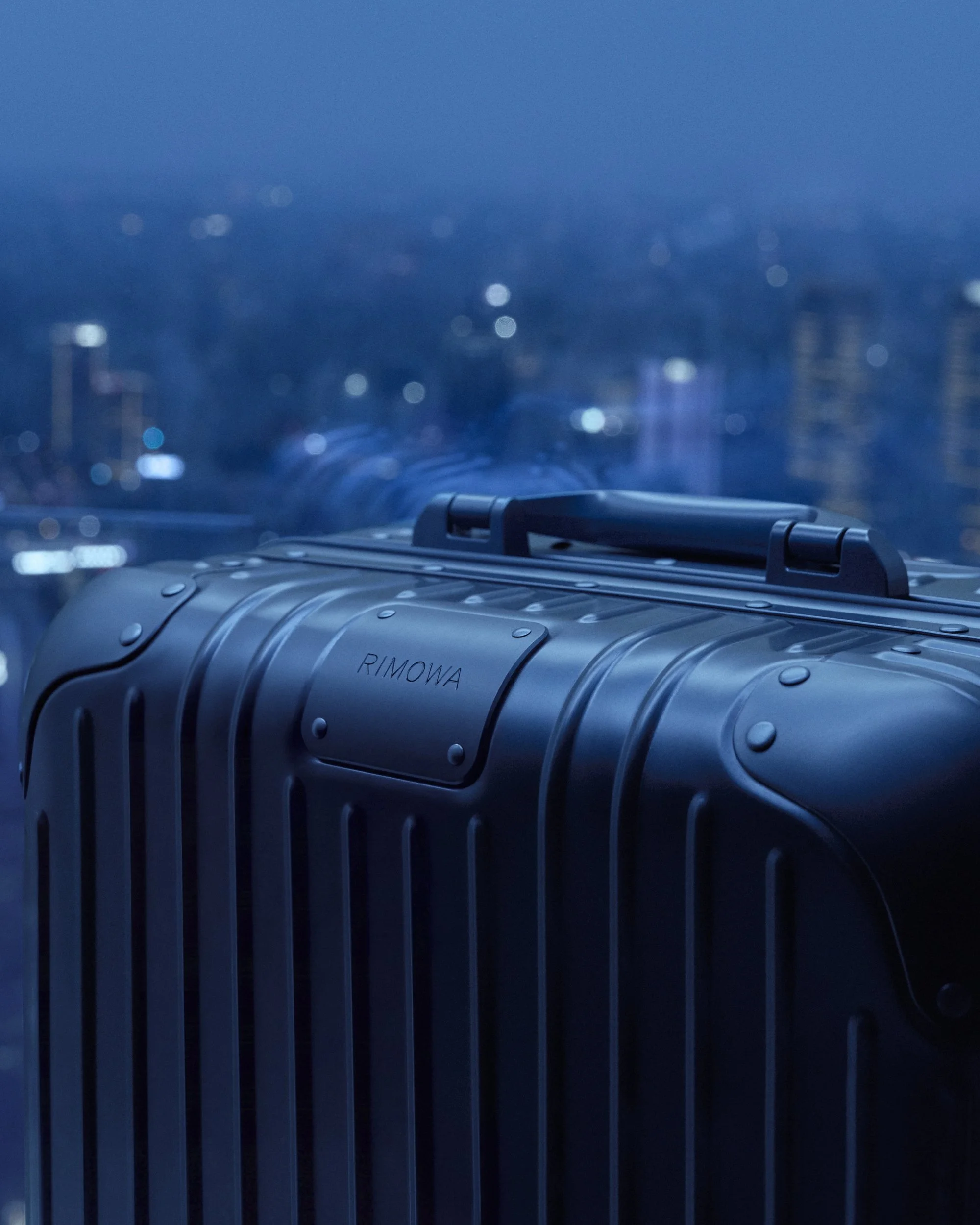 RIMOWA_Original_Ink Blue_Campaign_Still_4x5 (8).jpg
