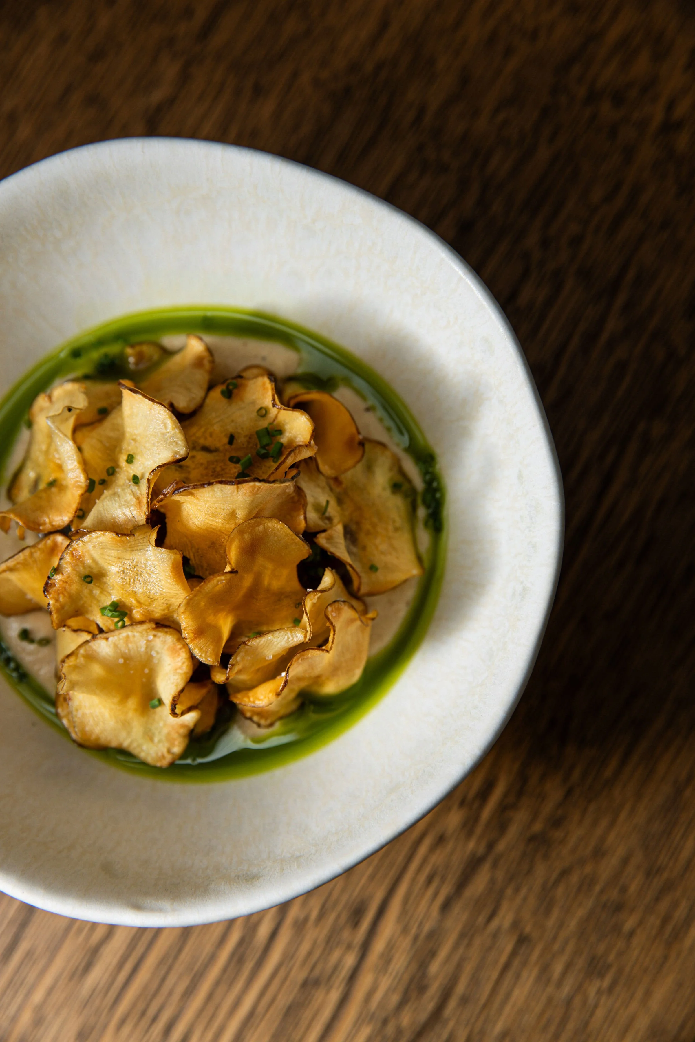 SINO_Beef tartar with ceps sabayon, Jerusalem artichoke chips and lovage oil Credit_ Viktoriia Klymentieva(1).jpeg