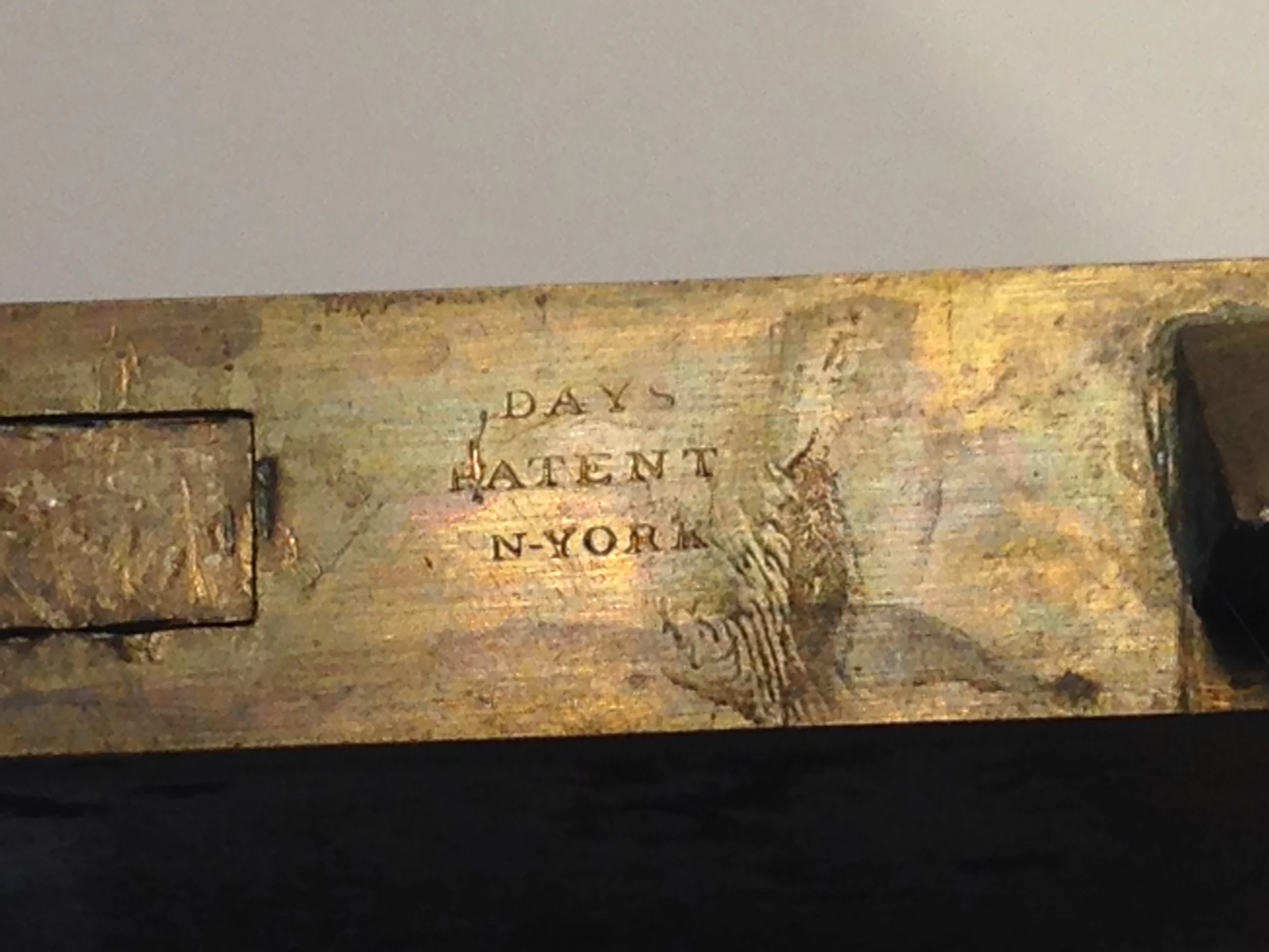 Some locks are designed to be mortised in the edge of the door.  These are labeled "Day's Patent N. York"