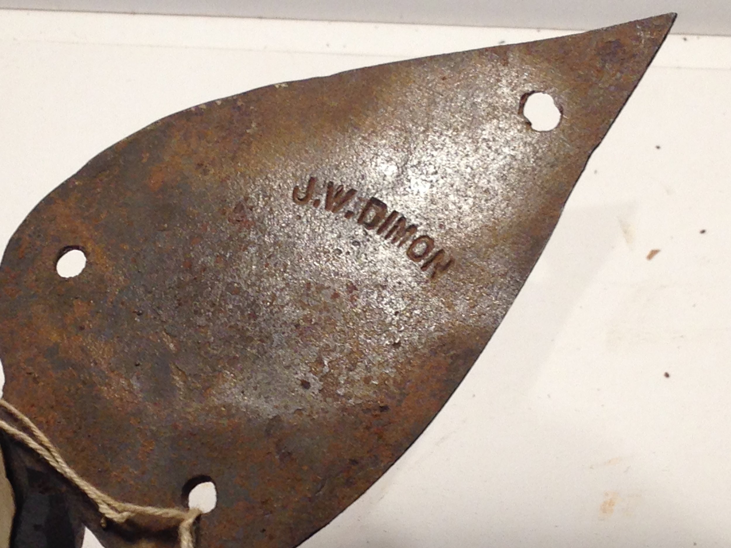 J. W. Dimon stamped on back of latch