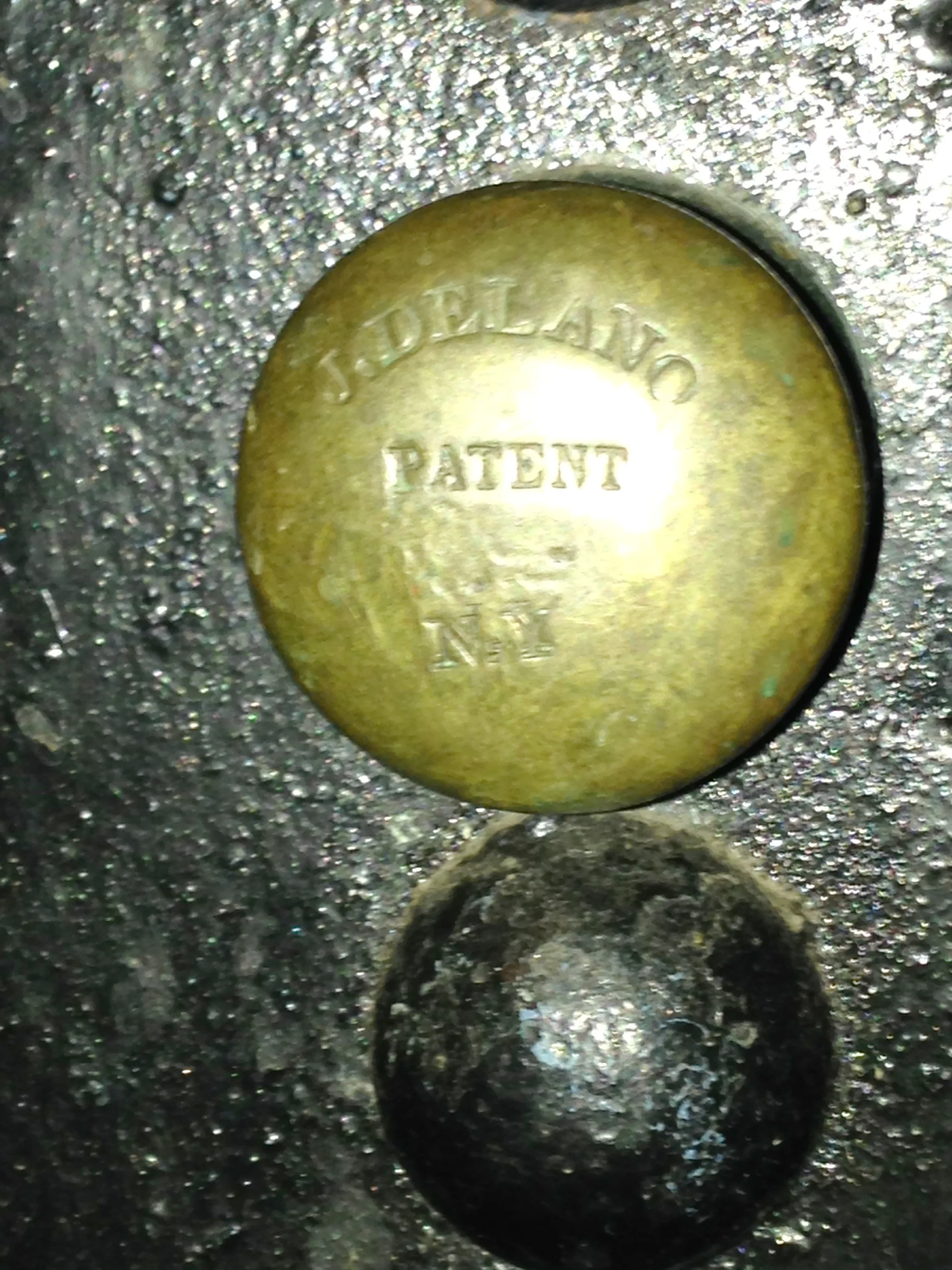 "J. Delano Patented N Y" on knob