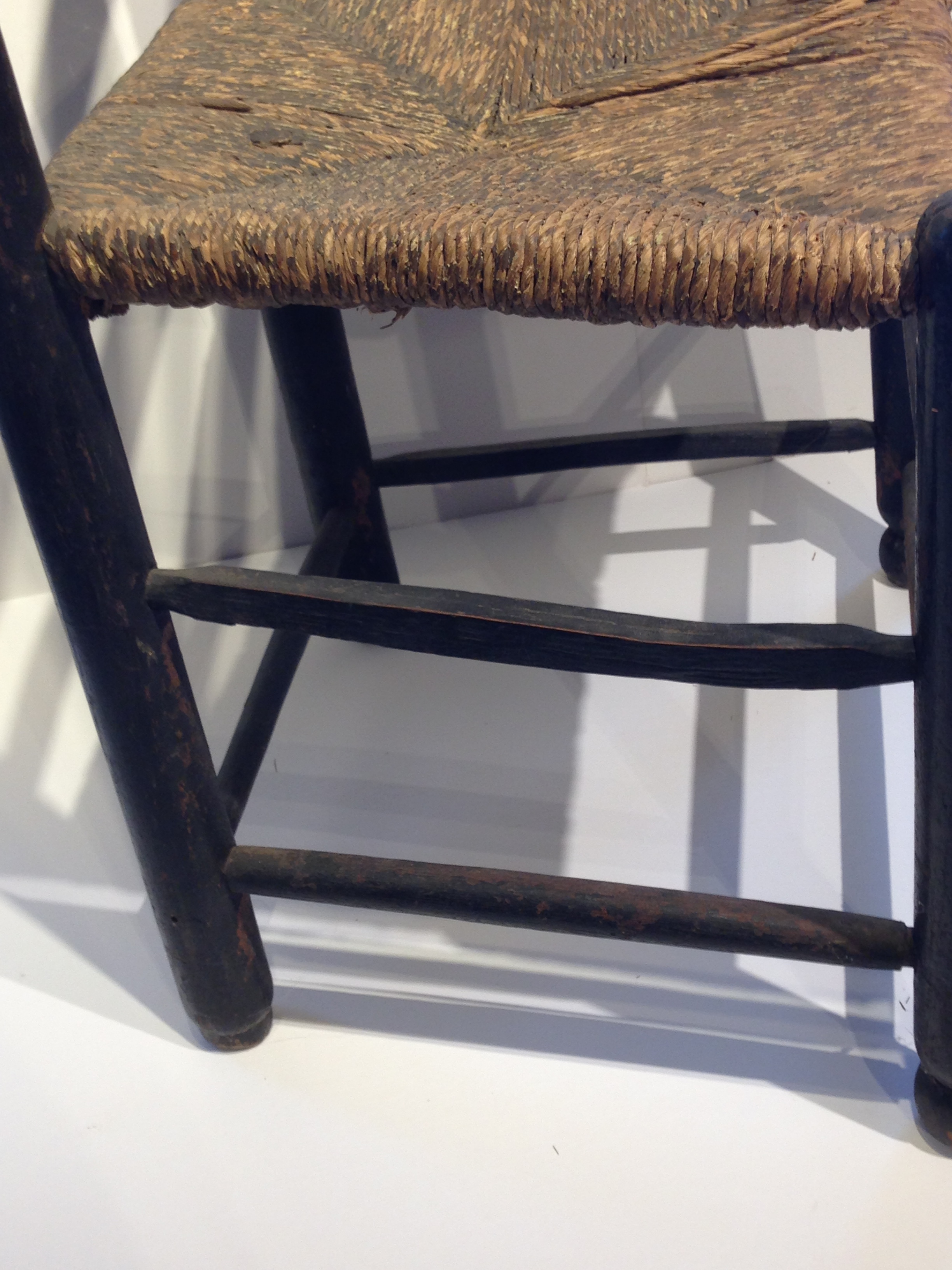 Some of the stretchers on this chair are split and some are turned.