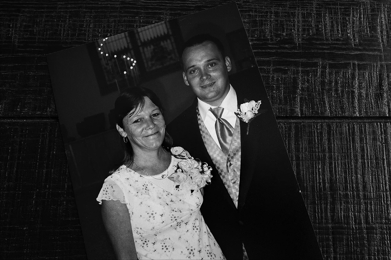 July 2017: Following Vickie’s death, Clarence learned of a son Vickie had named David who lives nearby in Taylor, Mo. The two met to share stories about Vickie. David gave this photograph of Vickie at his wedding to Clarence. “Vickie was my mother. Back when we were younger kids, she'd come get us roughly two or three times a year, maybe more, and do things with us. But we were usually at the bar playing pool, me and my brother, and she'd take us to the zoo and Six Flags, and stuff like that. But, then she'd quit coming around for years. Then, we moved closer, and I got back in touch with her and she got married and was doing great. She came to my wedding, and we'd stay in touch, and everything. She was doing fine then her husband lost interest in her, because of her drinking habit. So, she kind of drifted off. I'd still get in touch with her every once in a while, and then she would be gone. She didn't ask for nothing; didn't want nothing. But, I mean, after that, I got in touch with her seven years ago and we talked and then probably a year later she called me apologizing for everything that she did to us and wasn't there or anything,” David said. “Then, her sister called me,” David continued. “Two or three weeks ago, maybe longer, about her being in the hospital and they were putting her in a nursing home. After that, the next time they called me was when she had a heart attack. Then, they left everything pretty much up to me. The doctors called me on a Saturday and told me that she's still unresponsive for three days and had a little bit of brain damage and they probably didn't think she would come out of it because they asked me to take her off the ventilator, so I did,” David said.