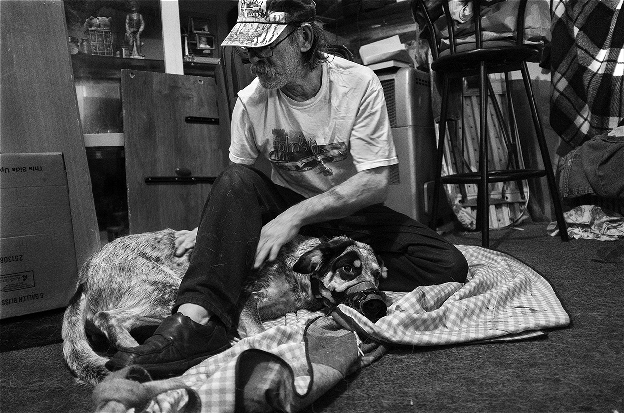 February 2017: Dennis tries to calm his dog, Levi, after Levi chewed on a razor and cut his paw. A friend took Levi to a veterinarian at Four Paws in Quincy who treated Levi and provided his needed shots for free. “I acquired Levi when he was a month old from an Amish family. They gave him to me as a present. He’s my companion, he’s my guard dog, he’s my best friend I don’t know what I would do without him. If I have to make a choice between me or my dog eating, my dog’s gonna eat." “There’s been times when I was wanting to go ahead and check out. Nobody’s gonna miss me. But Levi seems to bring me back to my senses, because I don’t know what’ll happen with him after I’m gone. He’s so loyal that if I was to walk out on a bridge and jump, he’d hit the water first to make sure he caught me. If I had a good friend like Levi, I would never have to question their trust, their friendship, to me. That’s one thing about Levi, I don’t never have to worry about turning my back, because he’s got me 360 degrees.”
