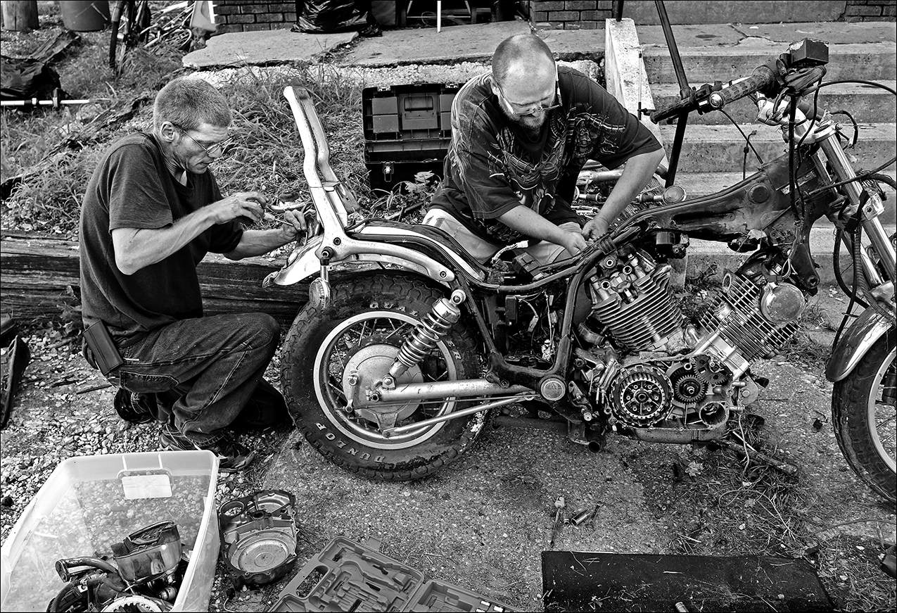 August 2016: James helps a friend tear down a motorcycle for parts. “I just try and help out whoever I can. If I see somebody needing help, I’ll stop and do it. I don’t even have to be paid for it; it’s giving me something to do to help others,” James said.