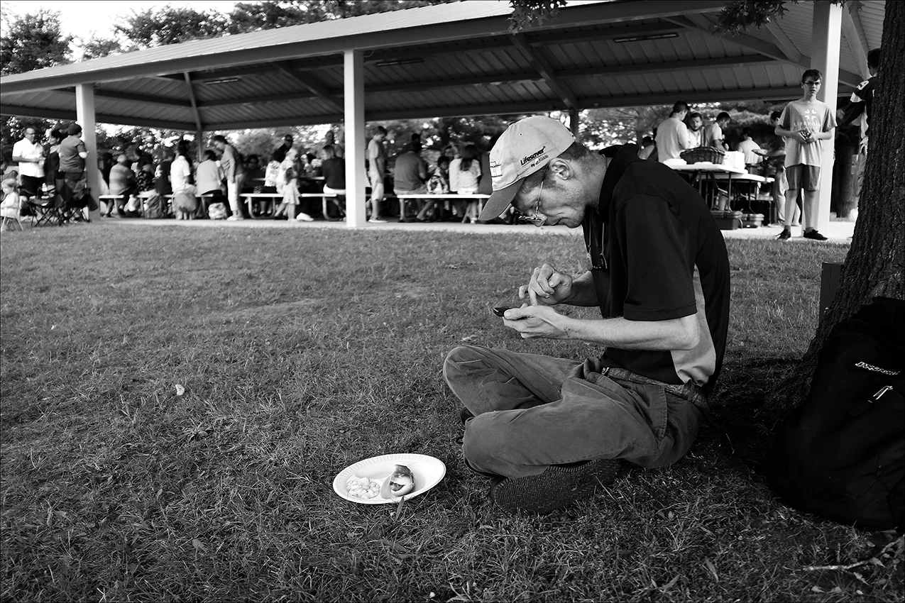August 2016: After walking 26 blocks in the August heat to attend church, James sits by himself at a church picnic following services. The meal is the only source of food he will have that day. “The friends I had would let me stay until my food stamps or my SSI check kicked in. I'd help pay the rent and help put food in the house and the next day, within a day or two, they'd kick me out because they got what they wanted. They figured I'd be the perfect person for that, because I'm living on the street. It just brings my self-esteem back down to where it was, back down real low. Sometimes it just makes me feel like I'm a welcome mat everybody walks on to get what they want and then when I actually need help, there's nobody there to turn to.”