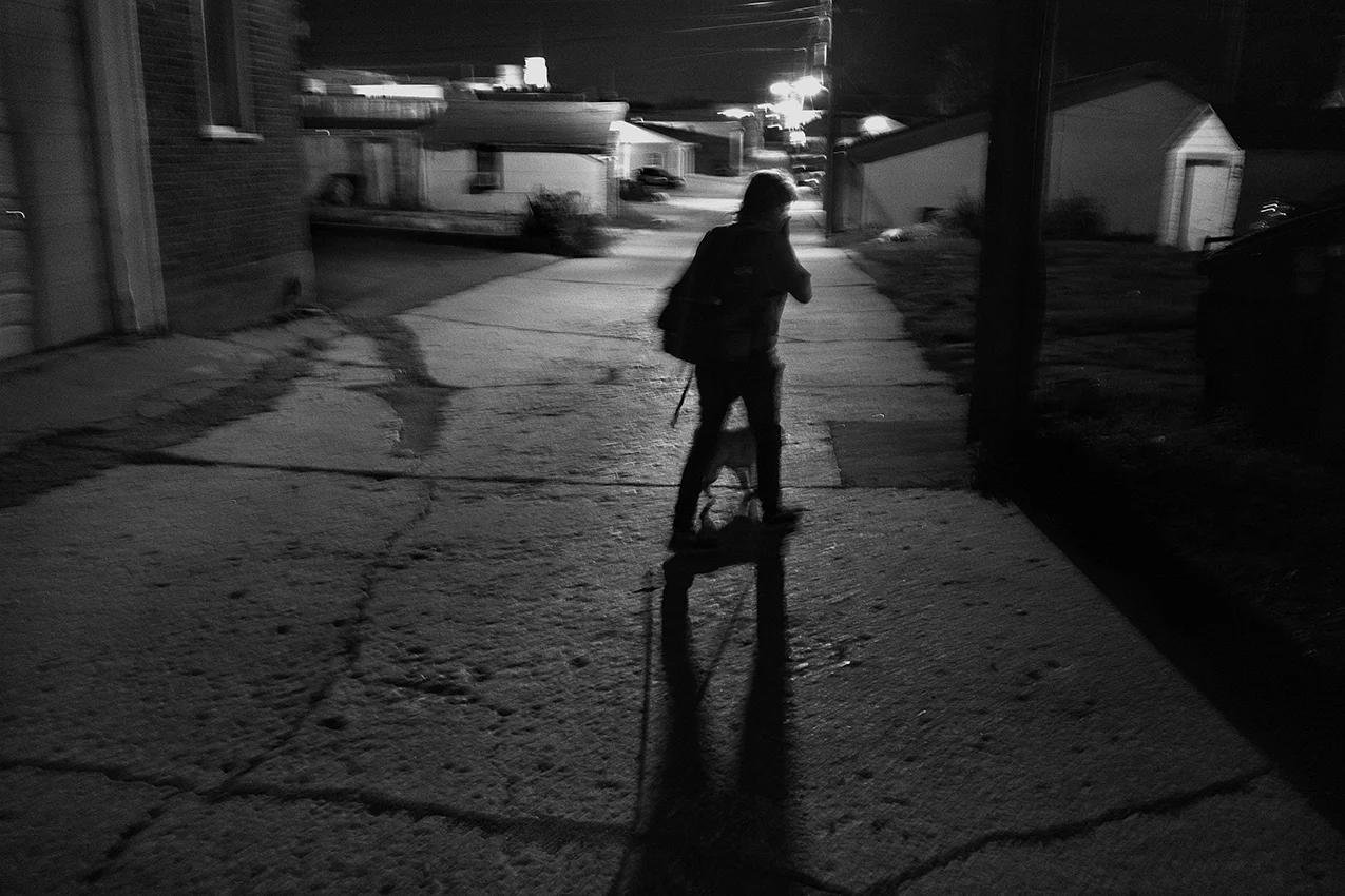 July 2017: Trish and her dog walk through an alley to check on an unlocked vacant apartment where she stayed the past few nights. The door was locked so she spent the night on a laundromat floor with newspapers for a blanket. Finding a safe place to stay is difficult. “I was staying in an abandoned house because the men that I thought were friends offered me a place to stay. But if I wouldn’t give them sex, I had to get out, and they treated me like crap. I mean I’m talking about four different people, people I thought were my friends for over 20 years. But if you don’t put out then you gotta get out. That’s why I’ve been sleeping on the streets. … You can’t sleep, you gotta sleep — you know the old saying, ‘Sleep with one eye open.’ Literally, that’s what I do. Every little noise scares you. You don’t feel safe.”