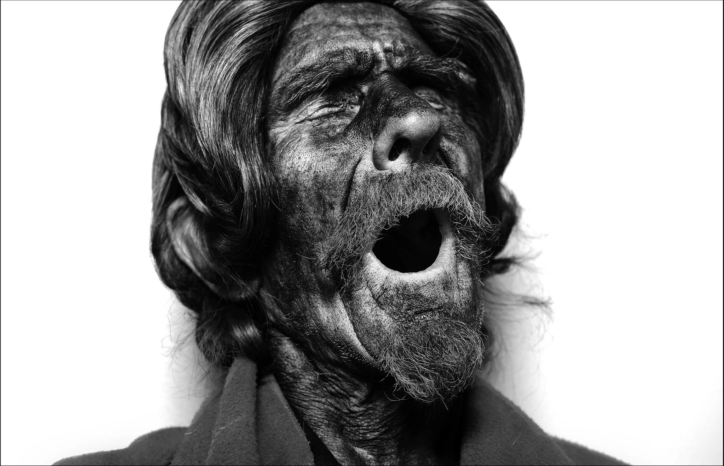 March 2017: Wearing mascara on his face, Walter breaks out in to a favorite country western song. Walter says he suffers from manic depression and schizophrenia. “I woke up this morning and just felt like being black. I’ll wear a wig from time to time — once I wore a skirt and had a friend put makeup on me — sometimes I just like to blow people’s minds." “I’ve been going to see psychiatrists up here in Quincy for about, oh, I ‘ve been seeing her for about five or six years now. That was the first bout I’d had with it after I got back to Quincy 22 years ago. And they put me on Seroquel, started me off on 100 milligrams and then it went up to 300 milligrams and that’s enough to kick an elephant’s butt, but it don’t phase me, and it don’t control my anger. It quiets me down, but it makes me groggy. So, about a year ago I just quit all of it, cold turkey, except my psychiatrist, I still make my appointments with her. … “The main thing I had against the medicine they were giving me to control my temper was that it made me groggy and I do like to be clear-headed. Side effects are lots of times worse than the problem that you had to start with.” Walter said he applied for Social Security disability benefits 20 years ago. “I was denied, and I didn’t push it with a lawyer, so I didn’t get nothing. I went back to work.”