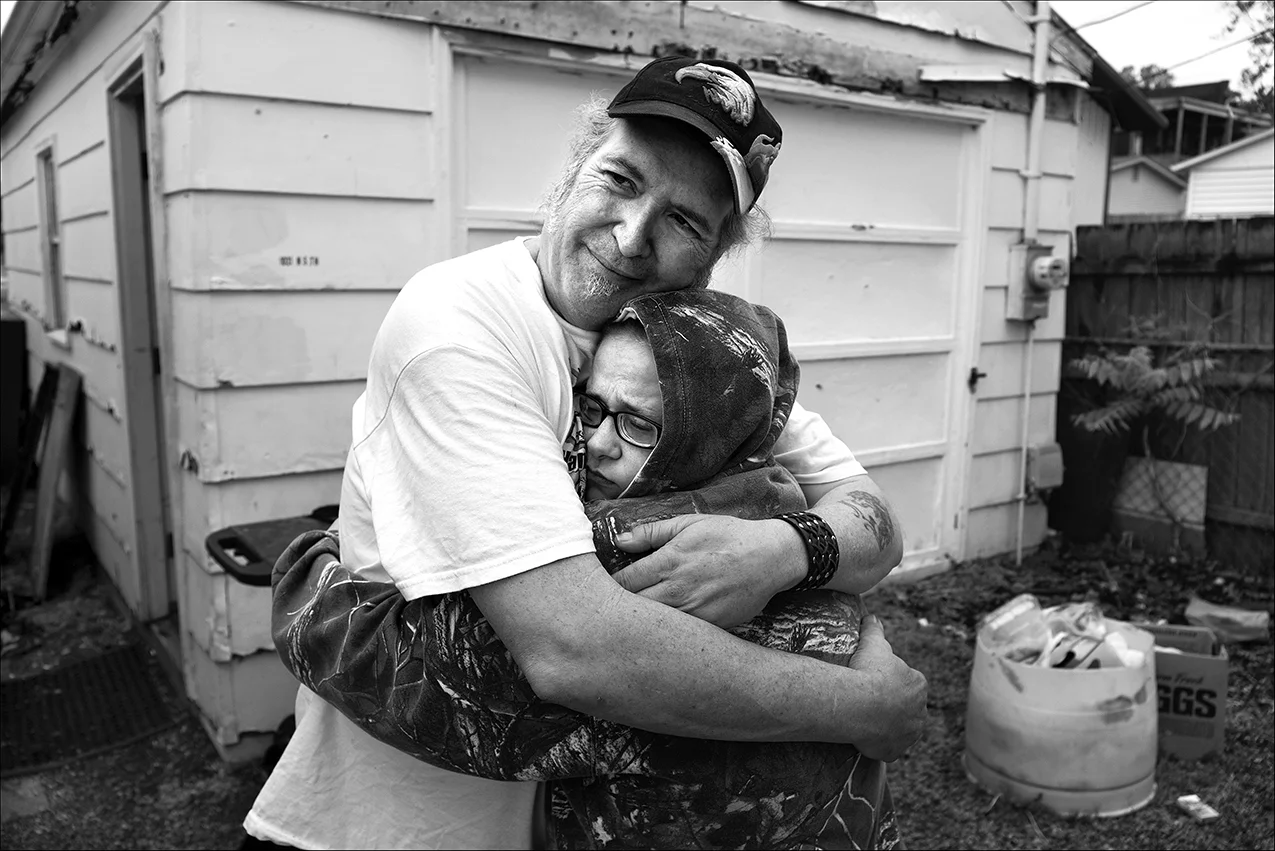 April 2017: Wendy is consoled by a friend when she tells him her girlfriend of 13 years broke up with her two days earlier. “Before my vision got as worse at it is right now, I used to work in a factory, fast food, you name it. Then I became fully disabled, and now I'm on this,” Wendy said. “My vision's always been bad, since birth. They say that you're born with borderline personality disorder too. I’m not sure about that, but here I am now.” Wendy says she gets health insurance benefits to help pay for her medications and doctor visits. “I get my medicine, and that's really all I worry about,” she said. “I can go in the hospital if I need to, and I'll be covered. It's important, because I'm nothing without my medication. If I didn't take those medicines, I don't know where I would be right now.” Wendy says she hears a fight outside every night while living on the north side of Quincy. “One day, these guys are going to bring a gun to this fight, and it's going to go straight through our window, through the alley right there and everything,” she said. “People fighting all the time, running everywhere, going crazy for their drugs. It's just not a safe place at night, and any more, during the day either. Just move onto the north side. You'll find out. Just don't go out at night. North side of Quincy's dangerous, and there's anxiety when people start pulling out their guns and shooting each other. I guess the north side of town's basically Quincy's ghetto. Best way I can explain it.” You see domestic violence like anything here. Just the other day, I saw some guy climb up on his girl's chest, beat the hell out of her. Nobody did anything, just sat there and watched. Isn't that crazy? So yeah, there's a lot of anxiety right there. There's not much to say about Quincy. It's become a little Chicago. At least that's what people call it.” 