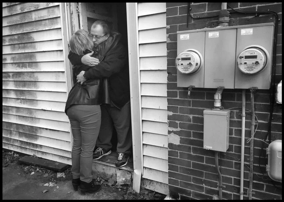 December 7, 2017: Sherry Hills-Garner and Chis exchange a hug after Sherry delivered a metal wheelchair ramp to clear his doorway step. Chris has been battling cancer for more than a year, as his family struggles financially. After a brief remission, the cancer has returned and has now invaded his lungs. Chris was recently provided a motorized wheelchair, however the family had no means to build a ramp for one small step. Upon learning of Chris’ situation, Sherry purchased a $60 ramp online for Chris. A couple more big-hearted individuals came forward to help the family with some Christmas needs. Thank you my friends for stepping up to help Chris and his family. They’ve endured significant health issues this year. It turns out some miracles can be provided for less than $100. I’m grateful for my many friends who understand this.