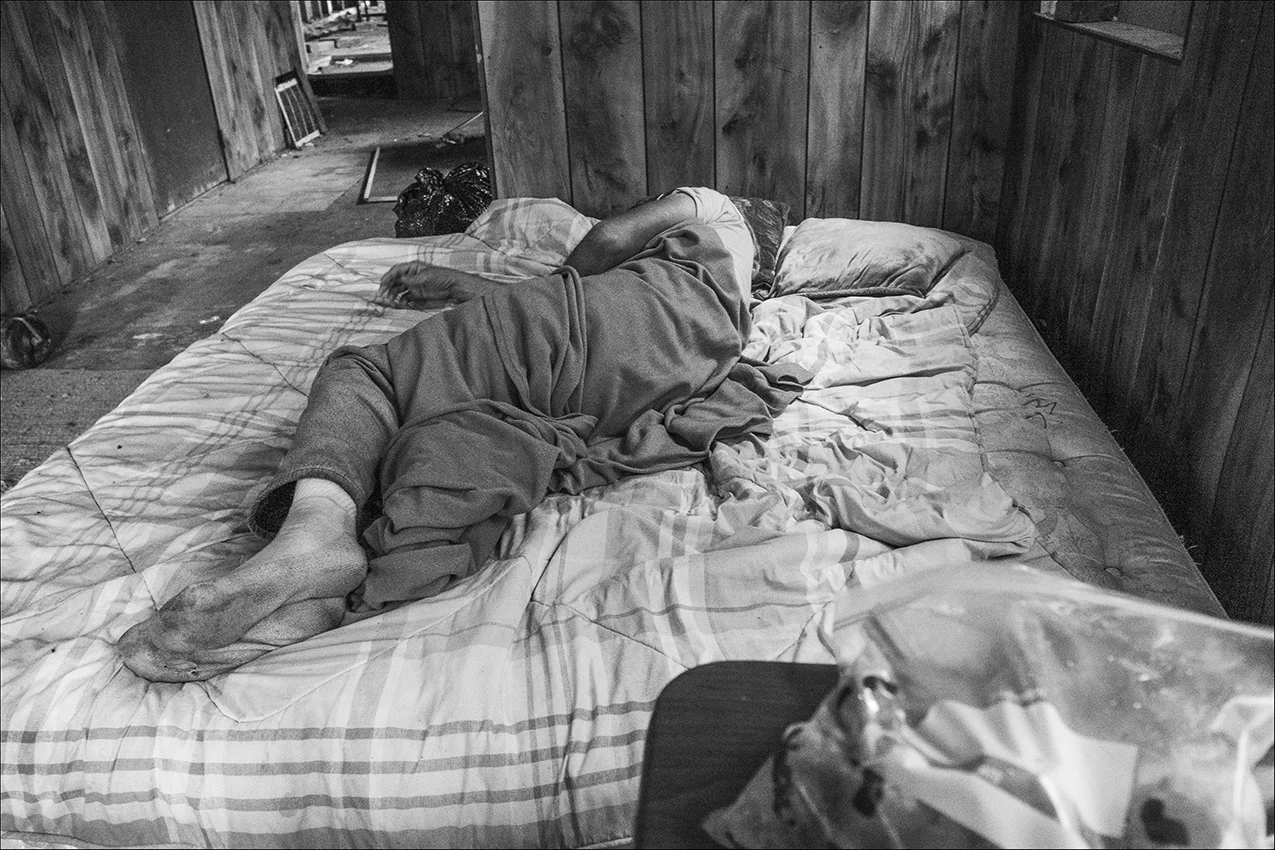 An homeless person who wishes to remain anonymous sleeps on a makeshift bed in a vacant building in Quincy, Wednesday, Oct. 10, 2018. There is a problematic shortfall in the number of shelters and safe and affordable housing in Quincy. Far too many people are suffering, because they can’t receive the assistance they need and deserve.