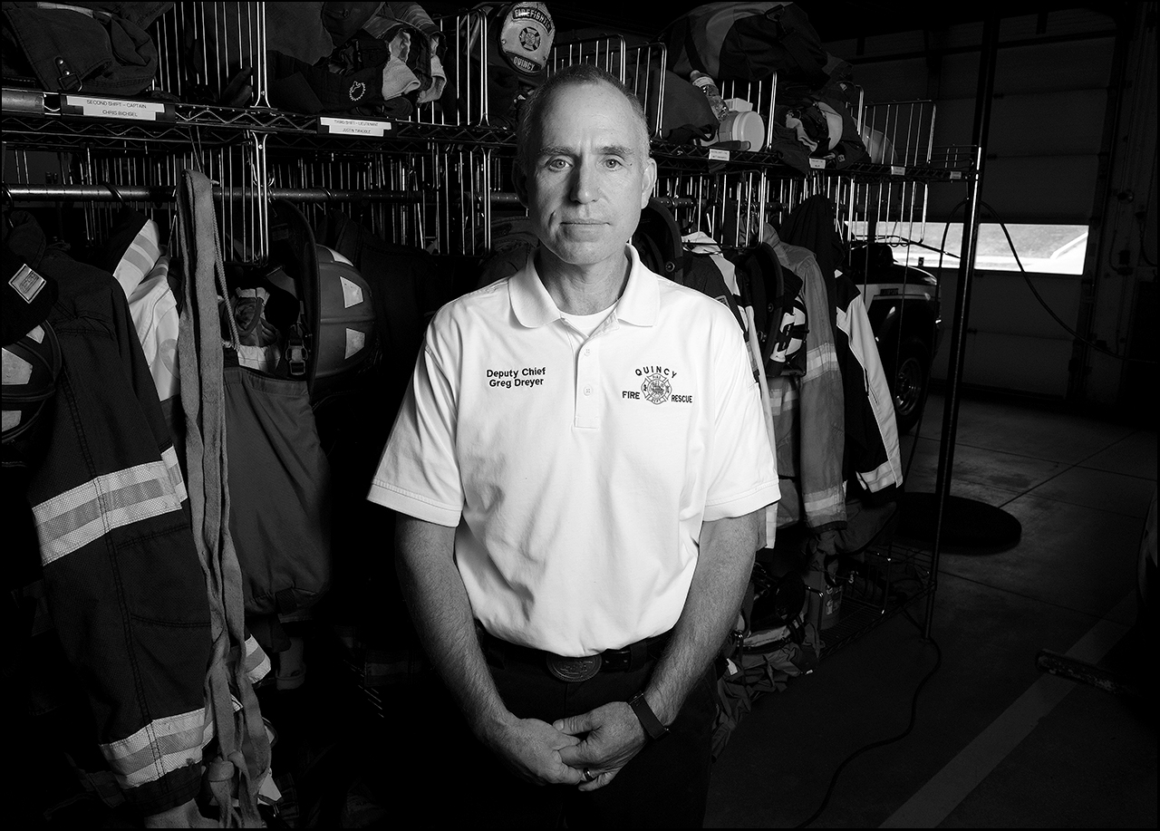 October 2018: “One of the best things we can do to put out a fire is prevent it from starting,” says deputy chief of operations, Quincy Fire Department, Greg Dreyer. “One thing we do have in Quincy, from time to time, we do have fatal fires and usually they occur in older part of the neighborhoods, the older housing. A lot of times they have been in rental properties.” Dreyer says if we had a proactive rental occupancy inspection, “maybe we could help prevent people from dying inside of fires.” Dreyer says a proactive rental occupancy inspection program would help catch a lot of problems early on. “Part of the proactive part of that would be an inspection where we’d catch things like electrical, gas leaks, and all the things that can be found and fixed before they turn into a fire.” Dreyer says a lot of the fire calls they go on are in the older parts of town, especially old buildings where electrical services and equipment on the sides of the buildings haven’t been updated. “Electrical is a big thing, sometimes we have problems with the old circuits. The new air conditioners, space heaters and things like that can’t keep up.” “One thing we do have in Quincy, from time to time, we do have fatal fires and usually they occur in older part of the neighborhoods, the older housing. A lot of times they have been in rental properties.” Dreyer says if we had a proactive rental occupancy inspection, “maybe we could help prevent people from dying inside of fires.” Dreyer adds, “No matter what kind of condition you're living in out there, there's things you can do to help hopefully, so if a problem starts, that you can get out of your house. Smoke detectors, CO detectors are also very important. The other thing I might recommend is the National Fire Protection Association, NFPA, has a home inspection checklist on their website you can go to. It walks you through your house and talks about things like if you're using a space heater, how far to keep combustibles away from it. It just talks about a little bit of everything. It's a little bit of a checklist that you can walk through your house and make your house safer.” “Currently in the city of Quincy, with the Red Cross, we come out and install free smoke detectors inside of people's homes for them. All you have to do is call the Red Cross or call the Quincy Fire Department. We'll come out and get those detectors installed. Second thing, if we get a smoke detector in the house, the second thing you should have, if you have gas appliances in your house, you should have working CO detectors, because CO is an odorless gas.” “If you have a furnace malfunction, or a hot water heater malfunction, a CO detector can save your life.”